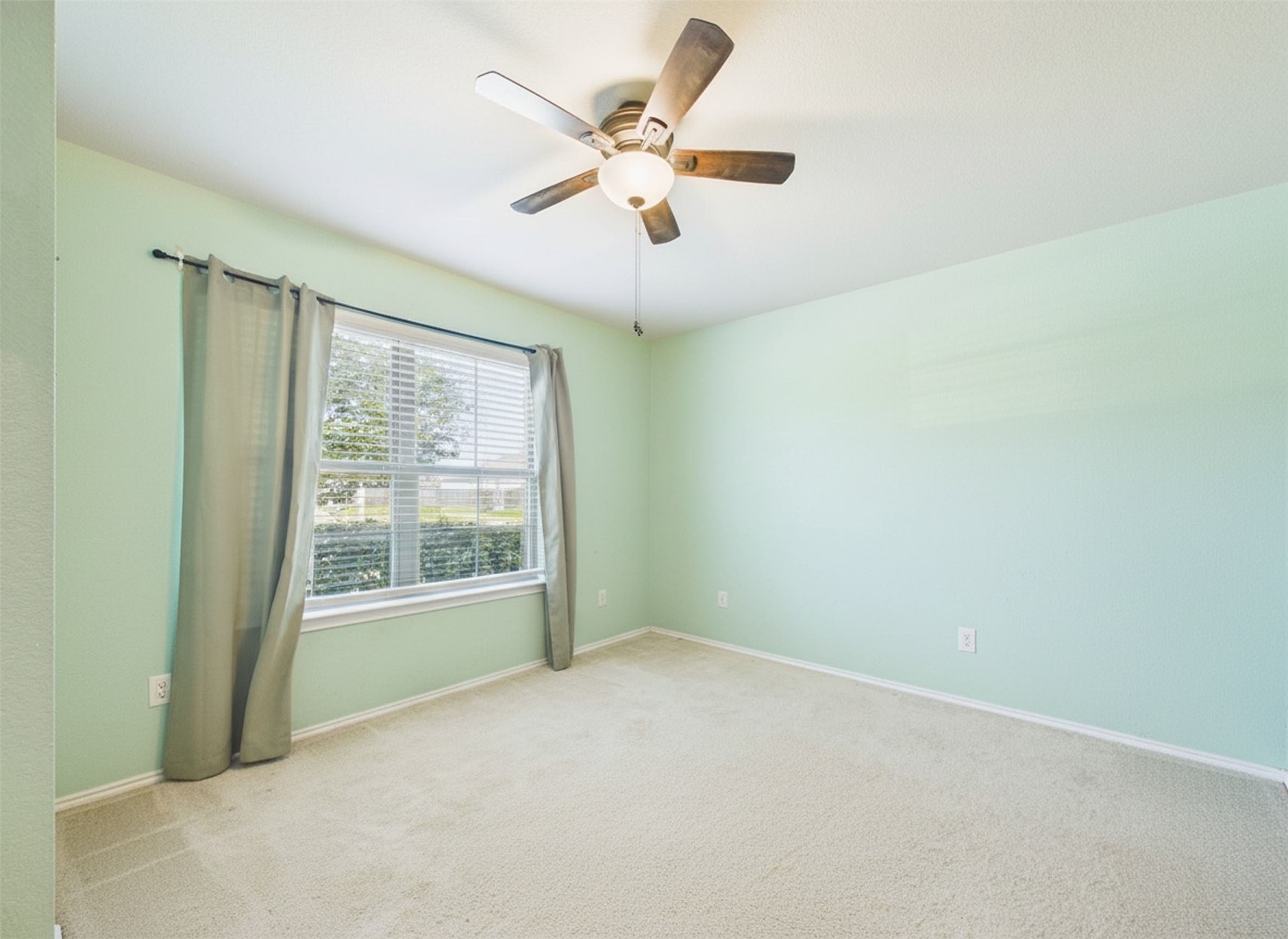 1237 Steed Bluff Drive Alvin, TX 77511 - Photo 32 of 50 a view of an empty room with a window