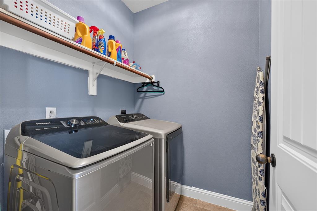 517 Austin Acre Road Sulphur Springs, TX 75482 - Photo 15 of 23 a utility room with dryer and washer