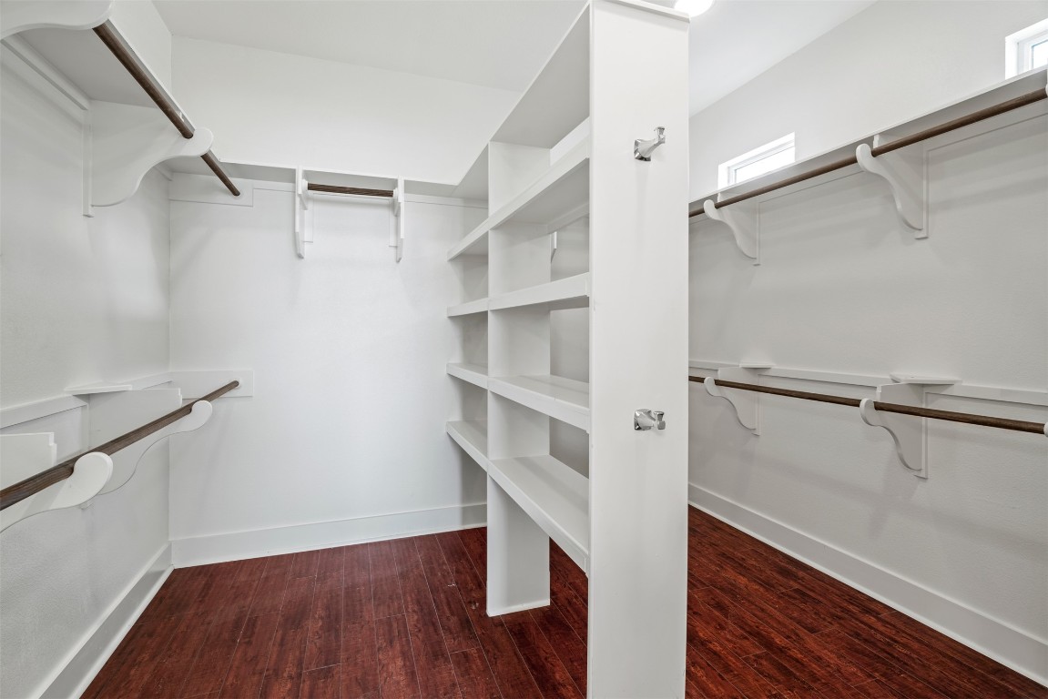 1912 South Church Street Georgetown, TX 78626 - Photo 23 of 40 a view of walk in closet with empty racks