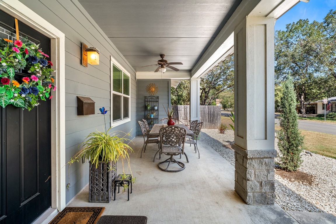 1912 South Church Street Georgetown, TX 78626 - Photo 3 of 40 a view of a porch with chairs and potted plants