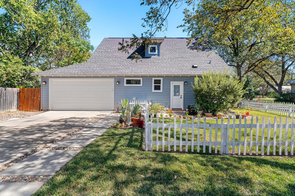 1912 South Church Street Georgetown, TX 78626 - Photo 39 of 40 a front view of a house with a garden