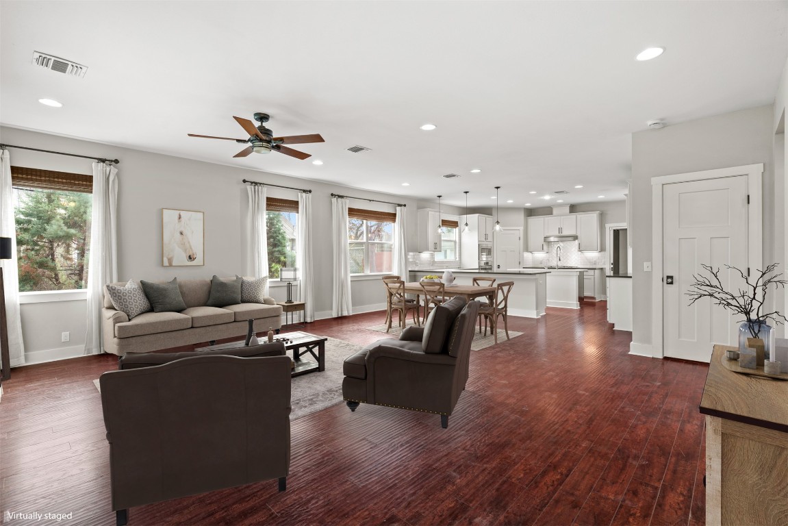 1912 South Church Street Georgetown, TX 78626 - Photo 4 of 40 a living room with furniture and wooden floor