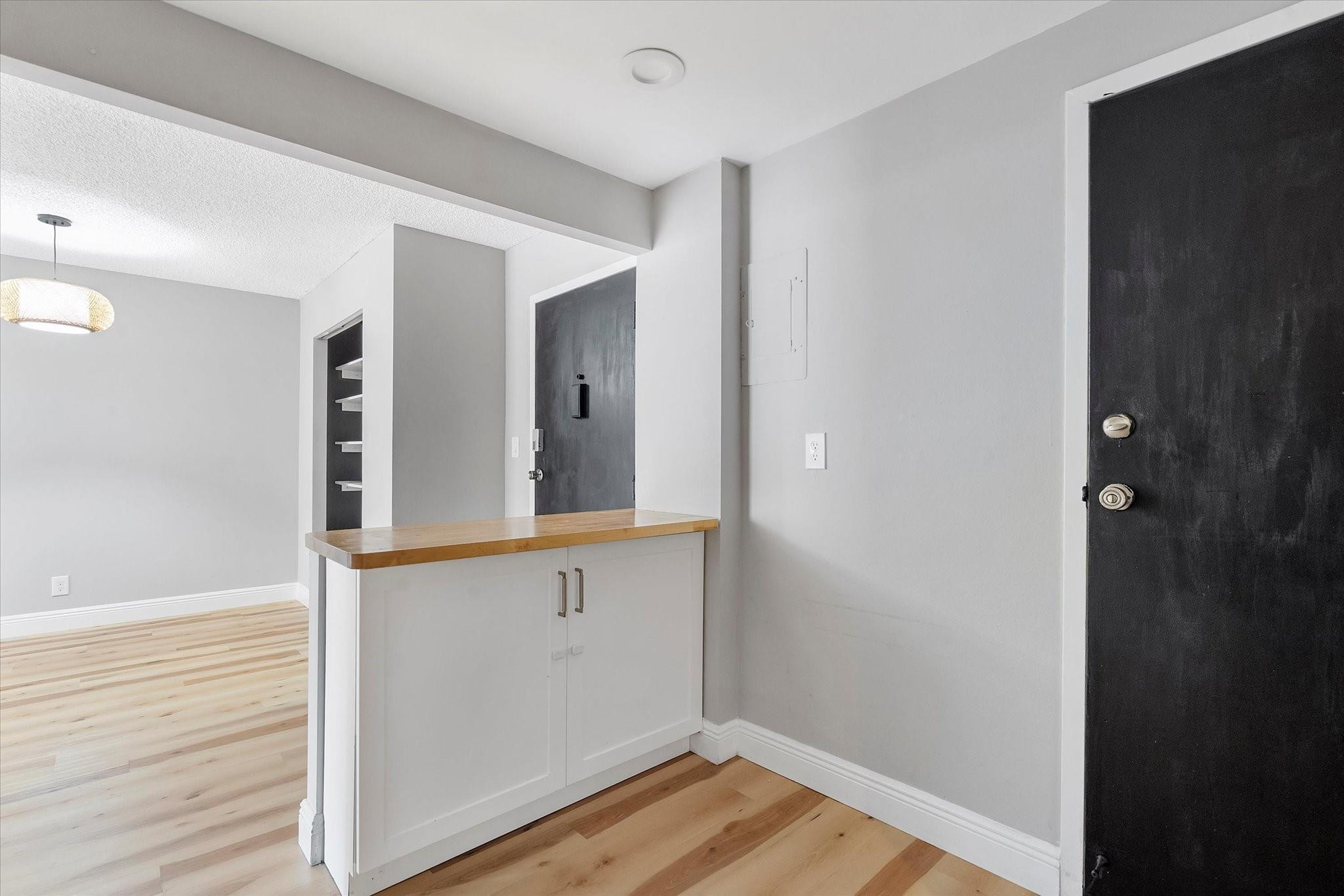 6500 Cypress Road, Unit 211 Plantation, FL 33317 - Photo 18 of 40 a view of walk in closet with wooden floor