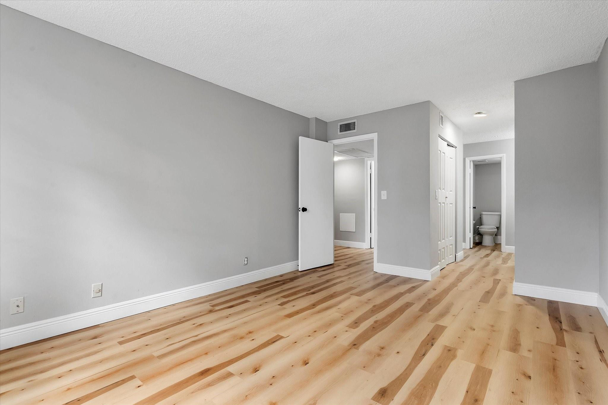 6500 Cypress Road, Unit 211 Plantation, FL 33317 - Photo 22 of 40 a view of empty room with wooden floor