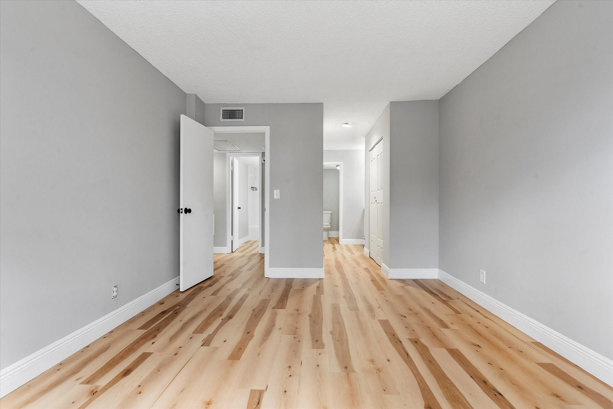 6500 Cypress Road, Unit 211 Plantation, FL 33317 - Photo 23 of 40 a view of a room with wooden floor