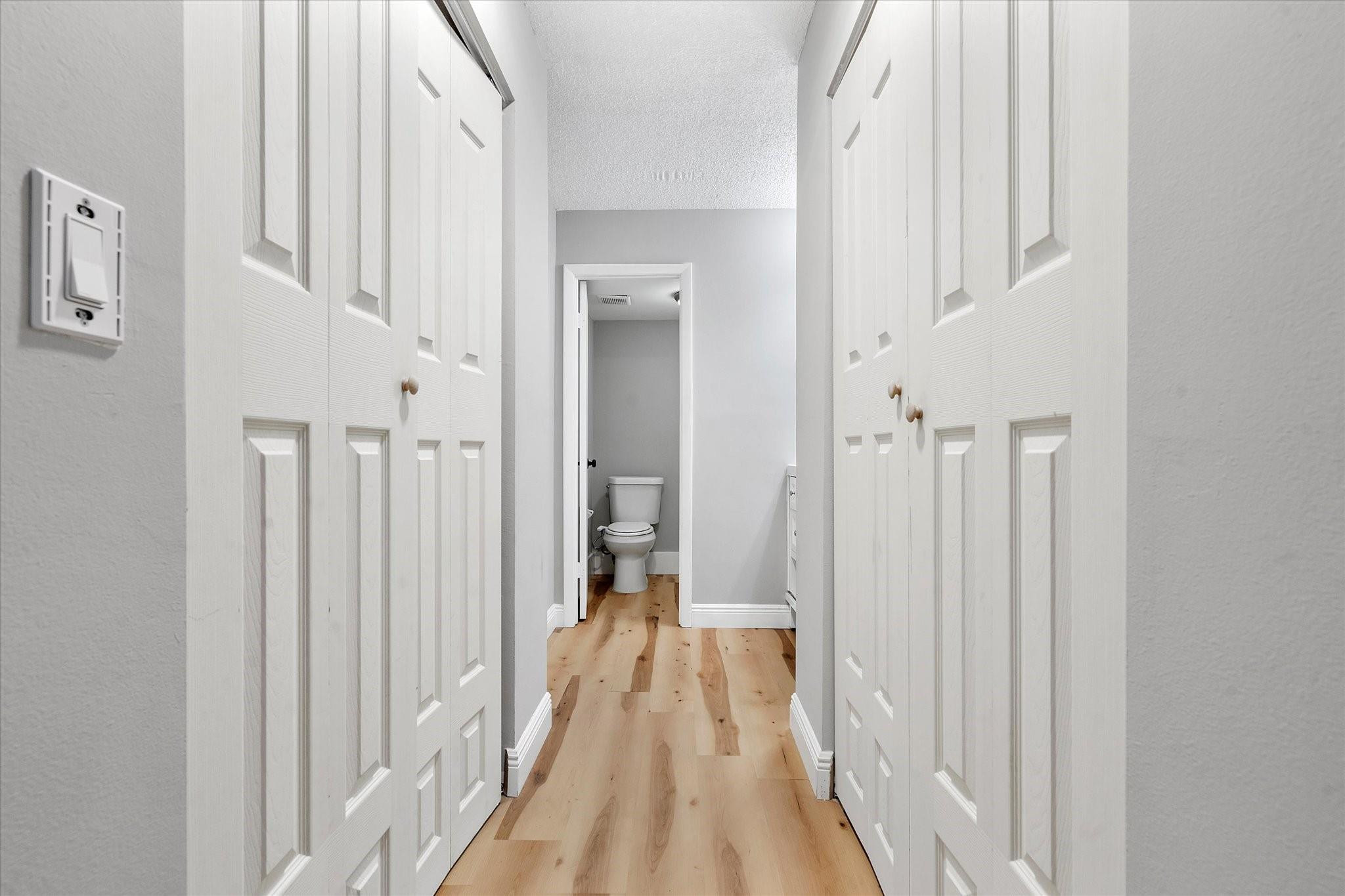 6500 Cypress Road, Unit 211 Plantation, FL 33317 - Photo 24 of 40 a view of a bathroom with sink and wooden floor