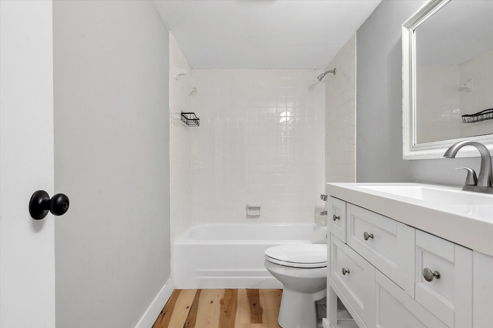 6500 Cypress Road, Unit 211 Plantation, FL 33317 - Photo 34 of 40 a bathroom with a sink a toilet and shower