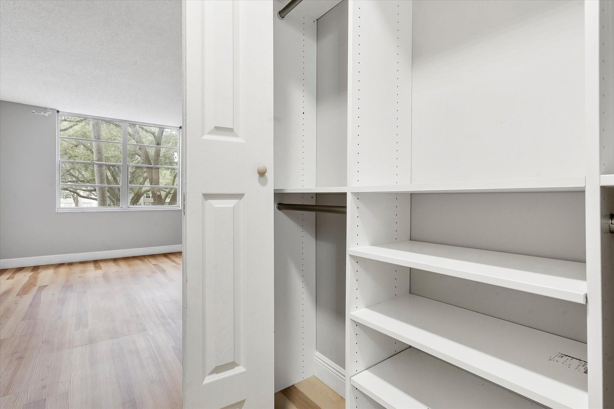 6500 Cypress Road, Unit 211 Plantation, FL 33317 - Photo 36 of 40 a view of walk in closet with empty racks