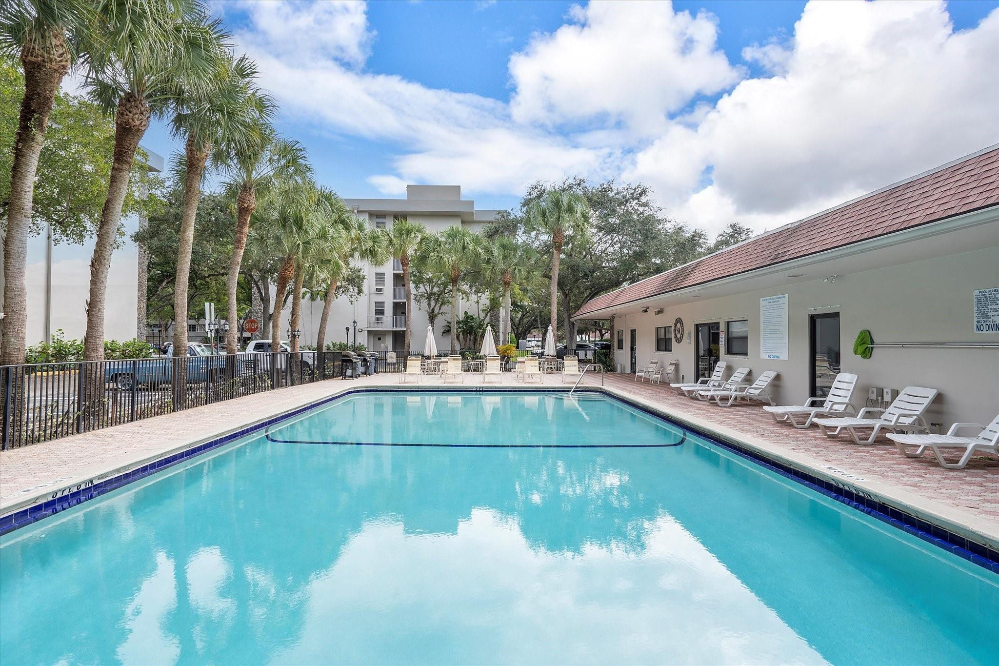 6500 Cypress Road, Unit 211 Plantation, FL 33317 - Photo 39 of 40 a view of a house with swimming pool