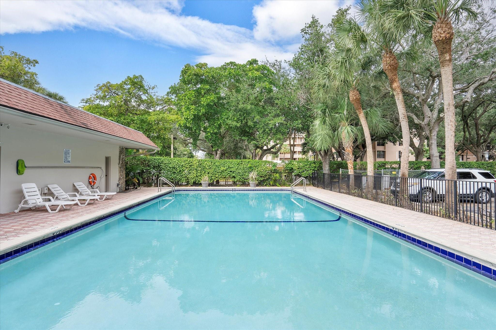 6500 Cypress Road, Unit 211 Plantation, FL 33317 - Photo 40 of 40 a view of swimming pool with a patio