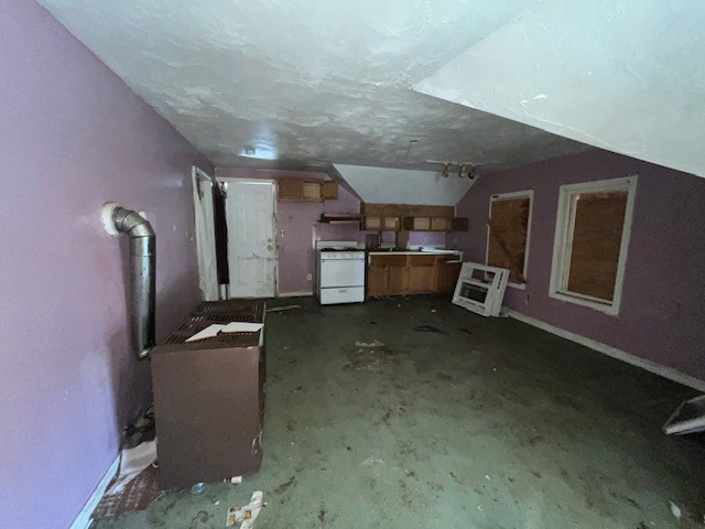 1814 Pleasant Street Fall River, MA 02723 - Photo 12 of 13 a kitchen with refrigerator and microwave