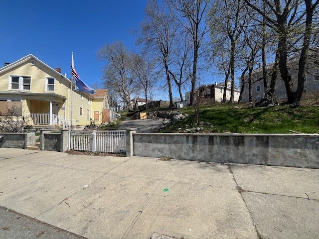 1814 Pleasant Street Fall River, MA 02723 - Photo 2 of 13 a view of house with outdoor space and seating area