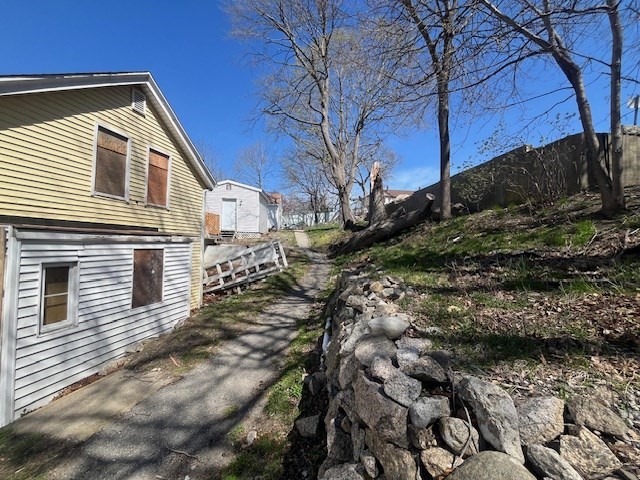 1814 Pleasant Street Fall River, MA 02723 - Photo 3 of 13 a view of a house with a yard