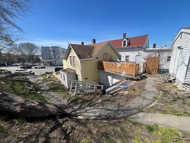 1814 Pleasant Street Fall River, MA 02723 - Photo 4 of 13 a view of a house with a backyard