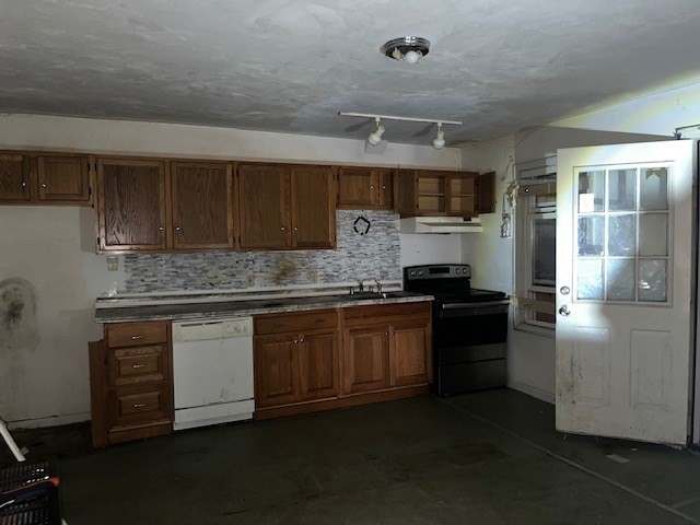 1814 Pleasant Street Fall River, MA 02723 - Photo 8 of 13 a kitchen with stainless steel appliances granite countertop a stove a sink and a refrigerator