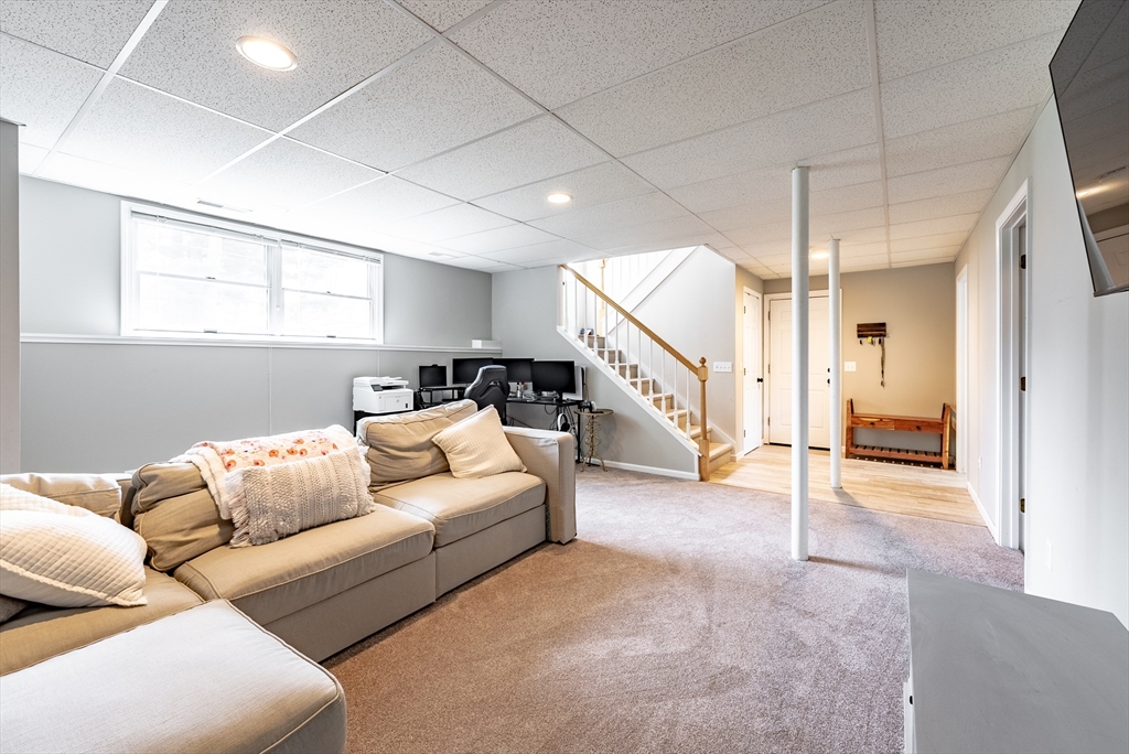 5 Corning Street Springfield, MA 01108 - Photo 23 of 29 a living room with furniture and stairs