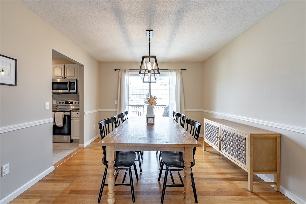 5 Corning Street Springfield, MA 01108 - Photo 9 of 29 a view of a dining room with furniture window and wooden floor