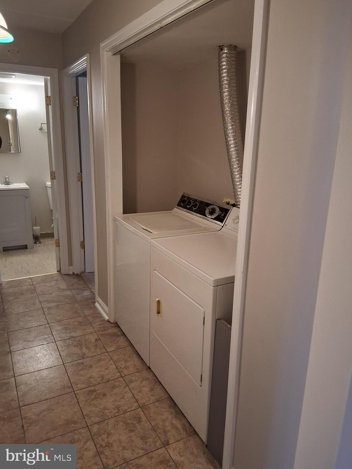 2305 Freetown Court, Unit 2B Reston, VA 20191 - Photo 11 of 15 a utility room with a window