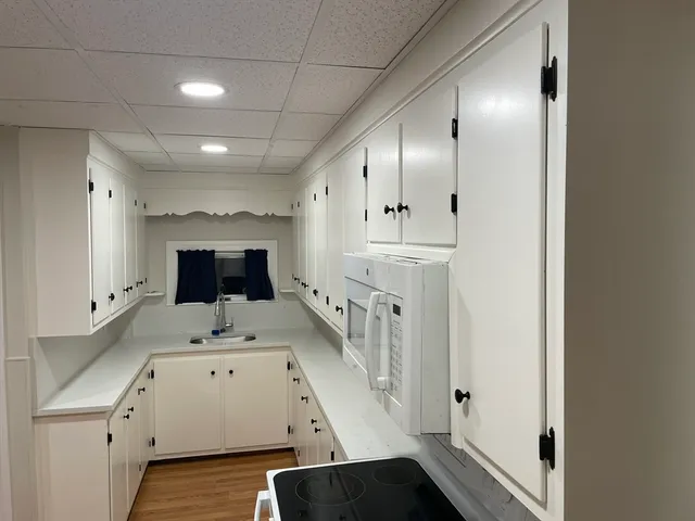 a view of bathroom with dual sinks