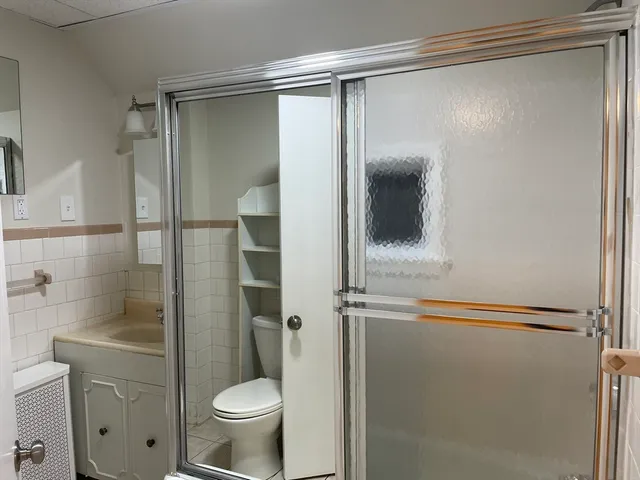 a view of an empty room with windows