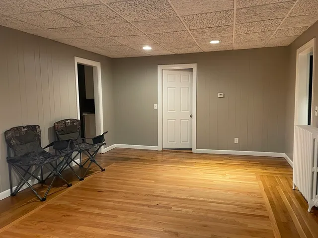 a view of workspace with wooden floor