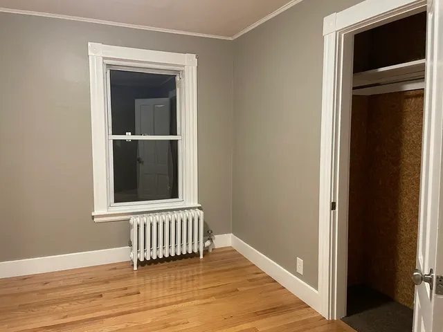 a view of a livingroom from a hallway