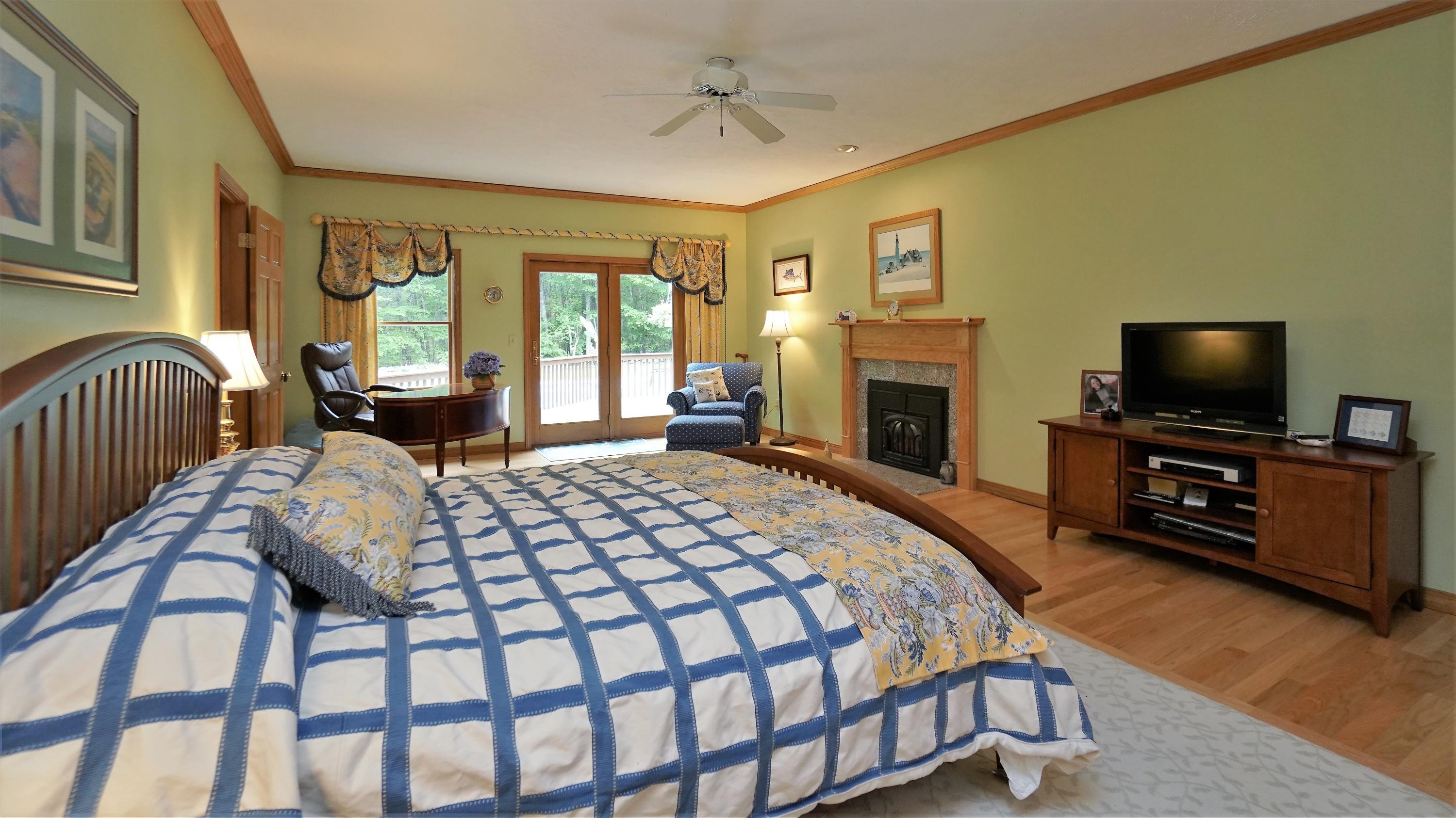 12 Pond Ridge Drive Lewiston, ME 04240 - Photo 26 of 69 First Floor Master Bedroom with Fireplac