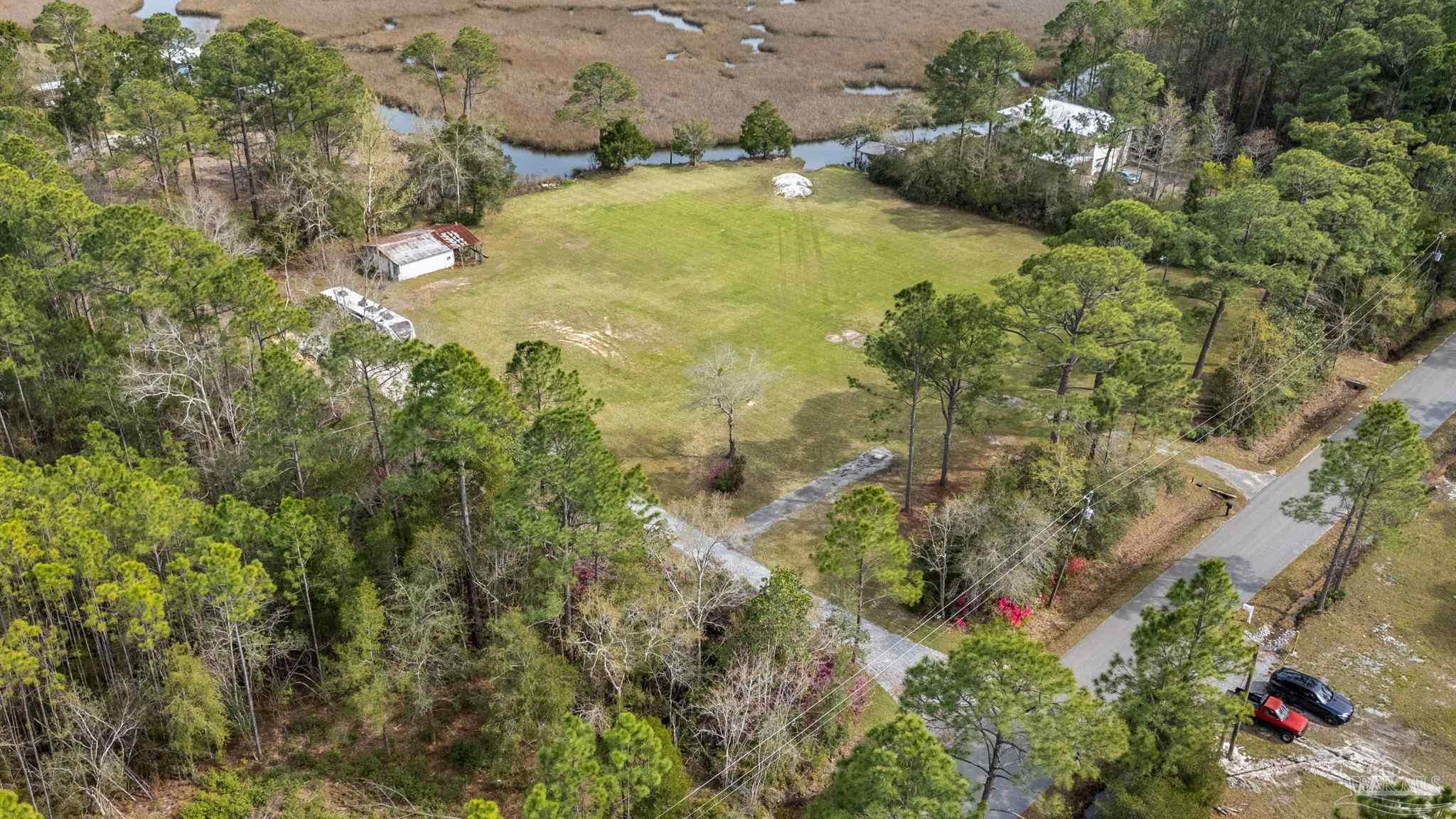 7524 Petersen Point Road Milton, FL 32583 - Photo 16 of 26 a view of a yard