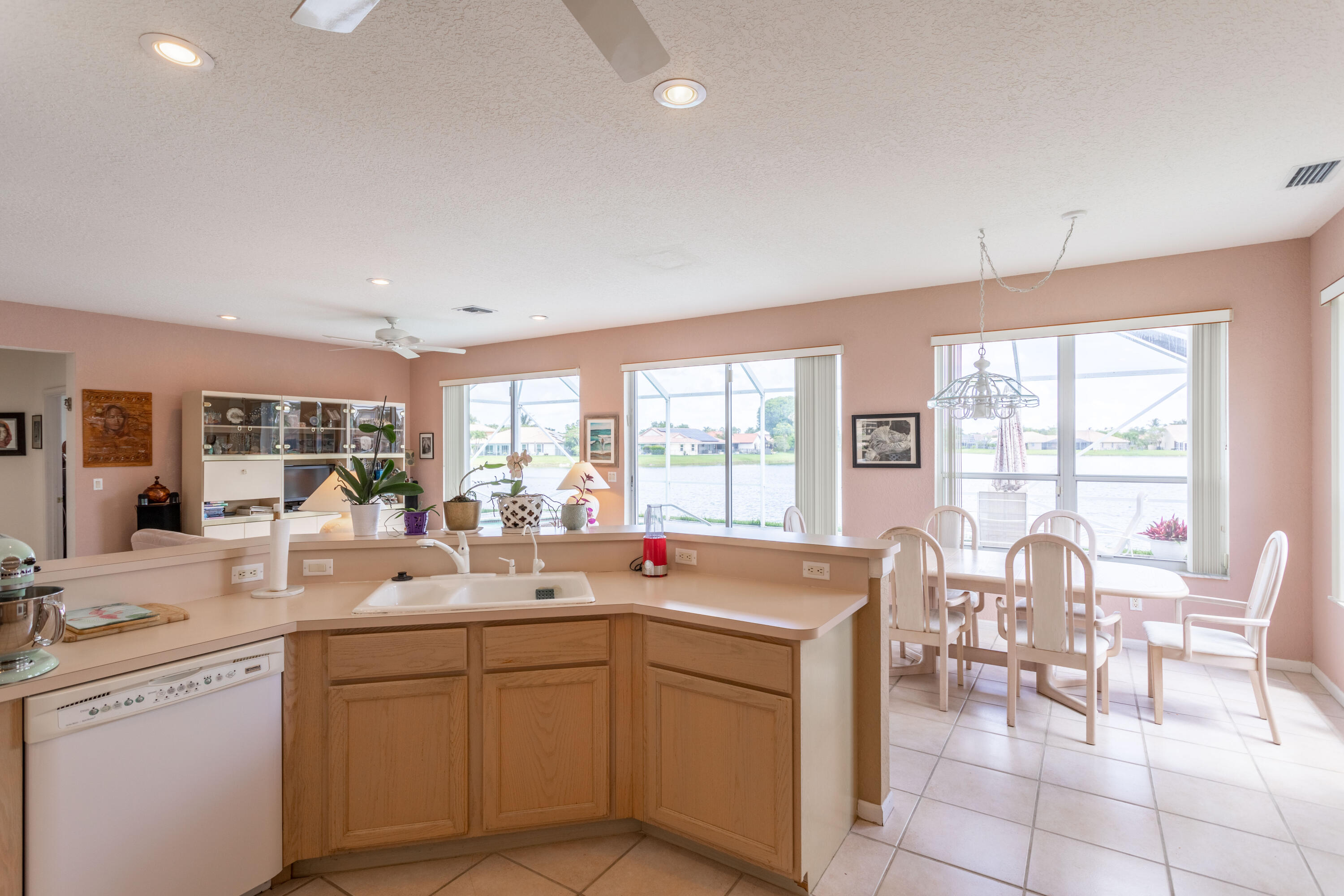 12601 Maypan Drive Boca Raton, FL 33428 - Photo 11 of 46 a very nice looking dining room with a large window