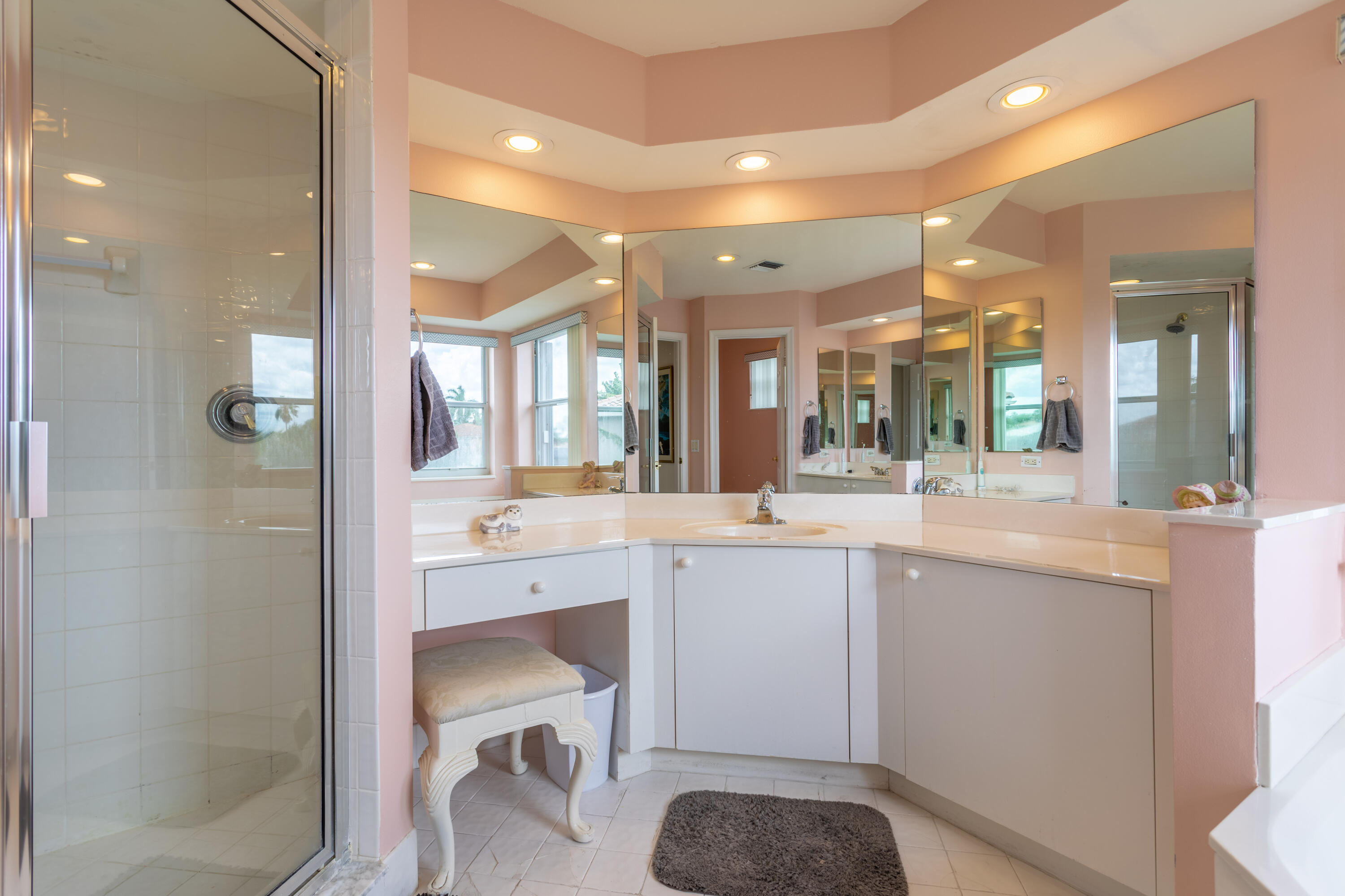 12601 Maypan Drive Boca Raton, FL 33428 - Photo 23 of 46 a large bathroom with a sink and a mirror