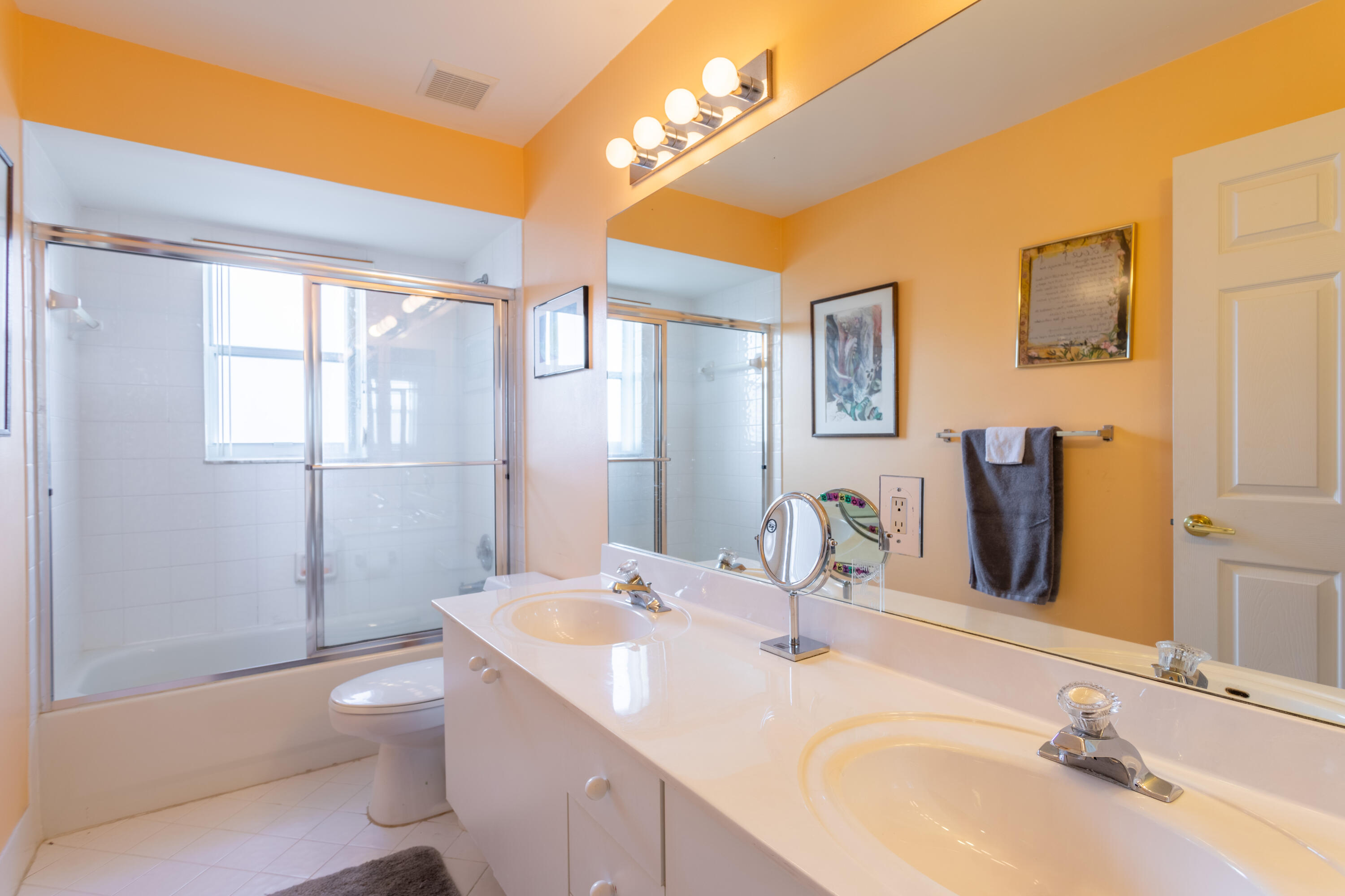 12601 Maypan Drive Boca Raton, FL 33428 - Photo 25 of 46 a bathroom with a granite countertop sink toilet and shower