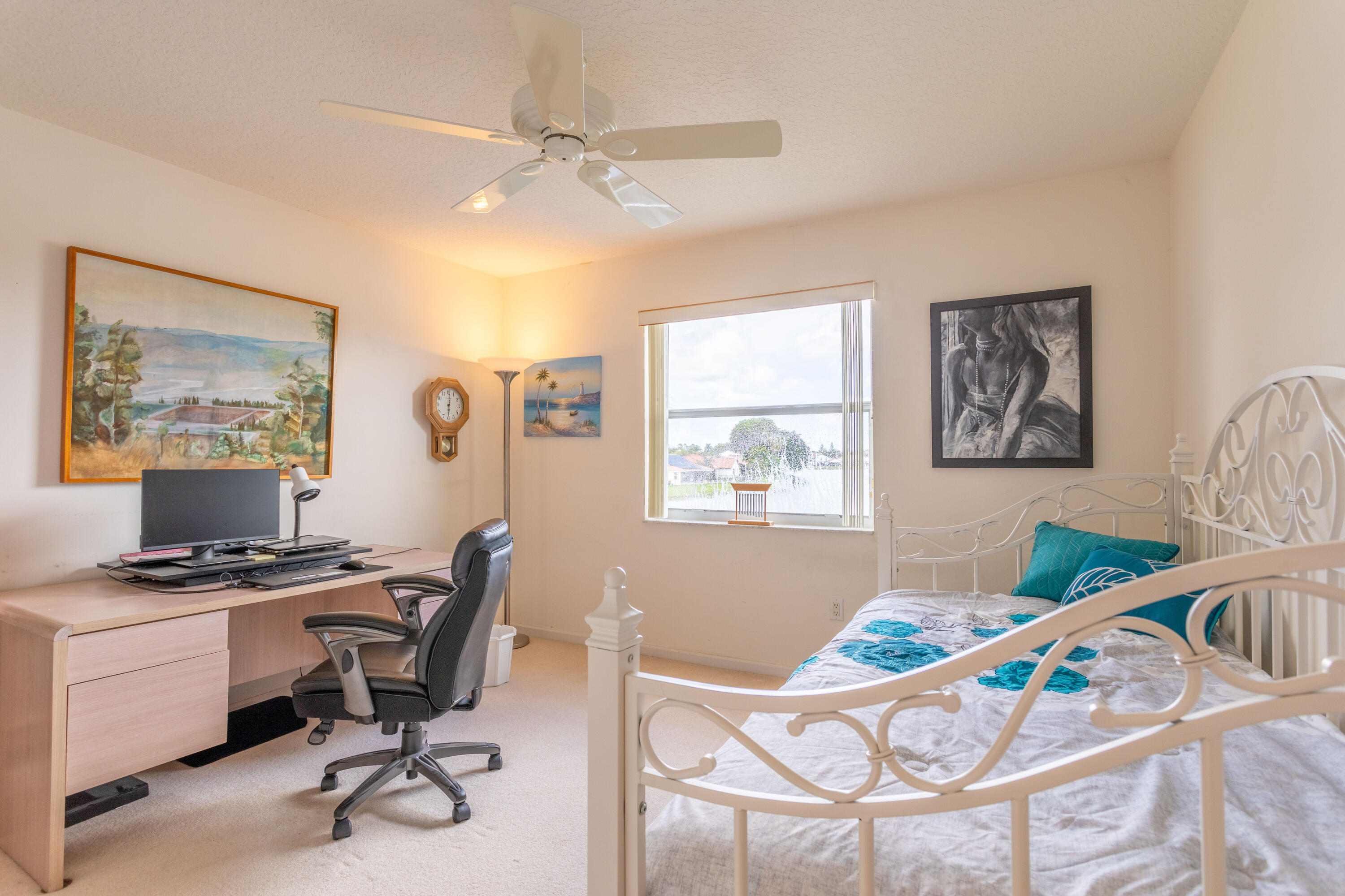 12601 Maypan Drive Boca Raton, FL 33428 - Photo 26 of 46 a view of a workspace with furniture and a window