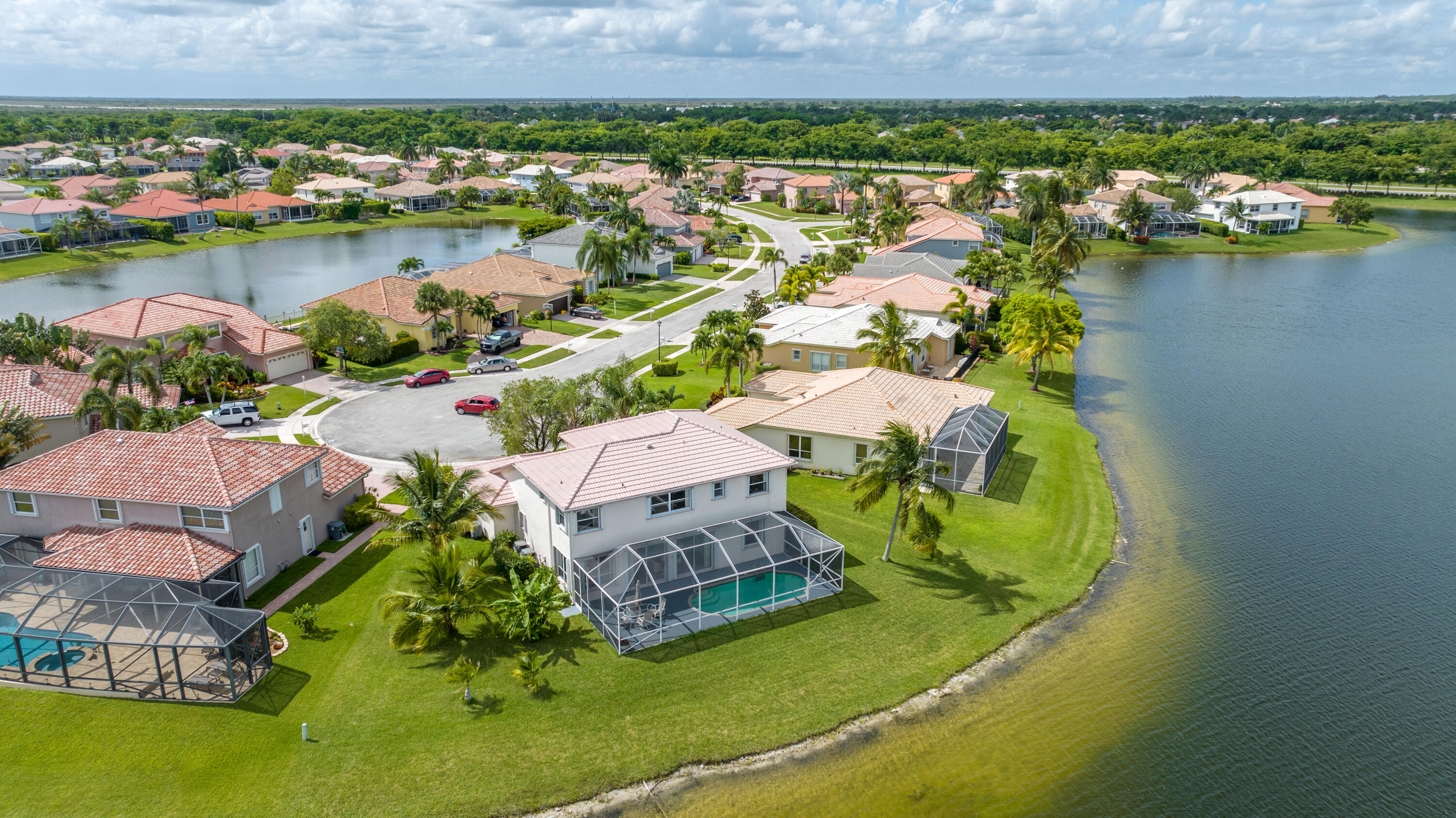12601 Maypan Drive Boca Raton, FL 33428 - Photo 39 of 46 an aerial view of a house with a lake view
