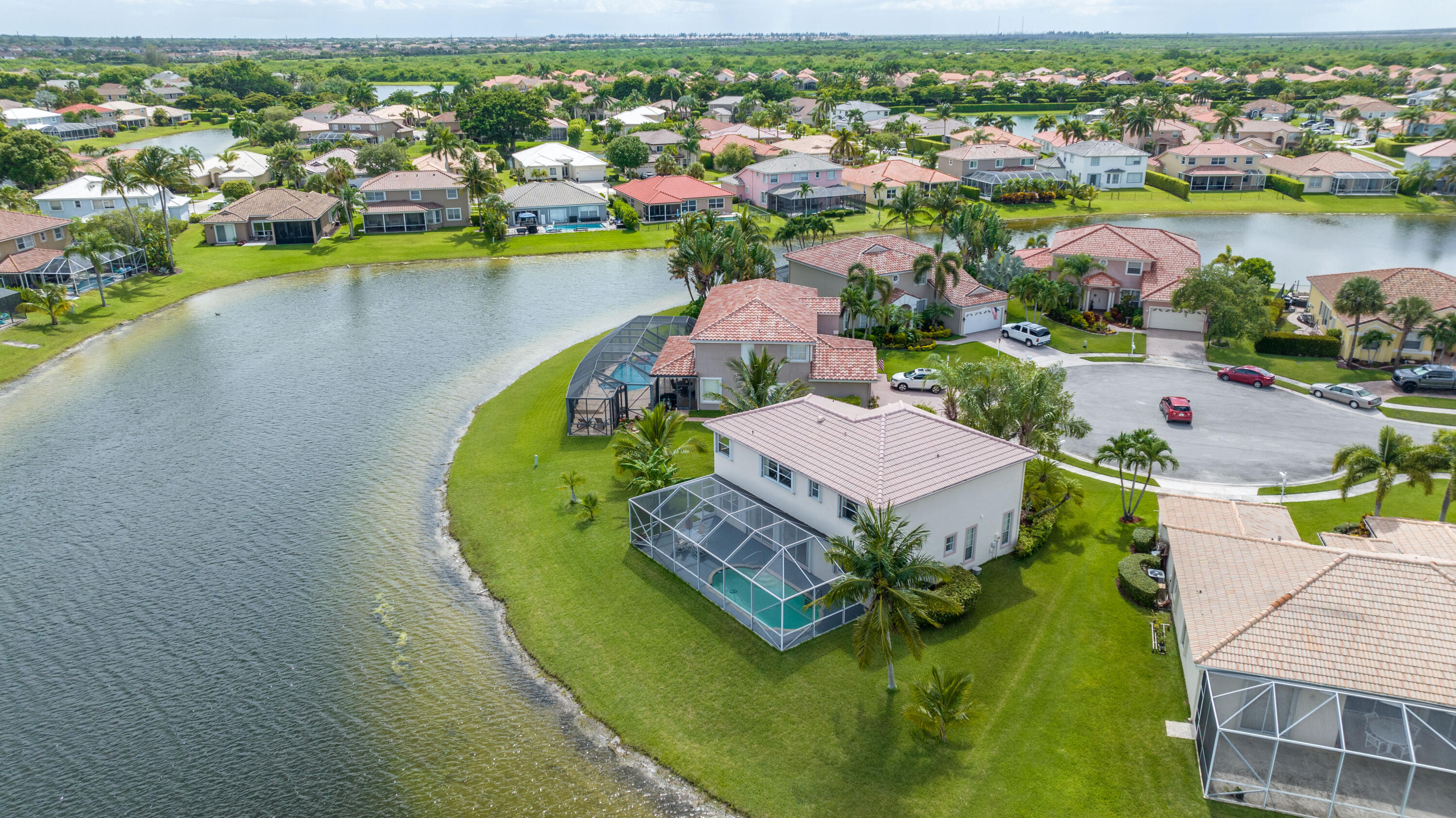 12601 Maypan Drive Boca Raton, FL 33428 - Photo 40 of 46 an aerial view of a house with a swimming pool yard and outdoor seating