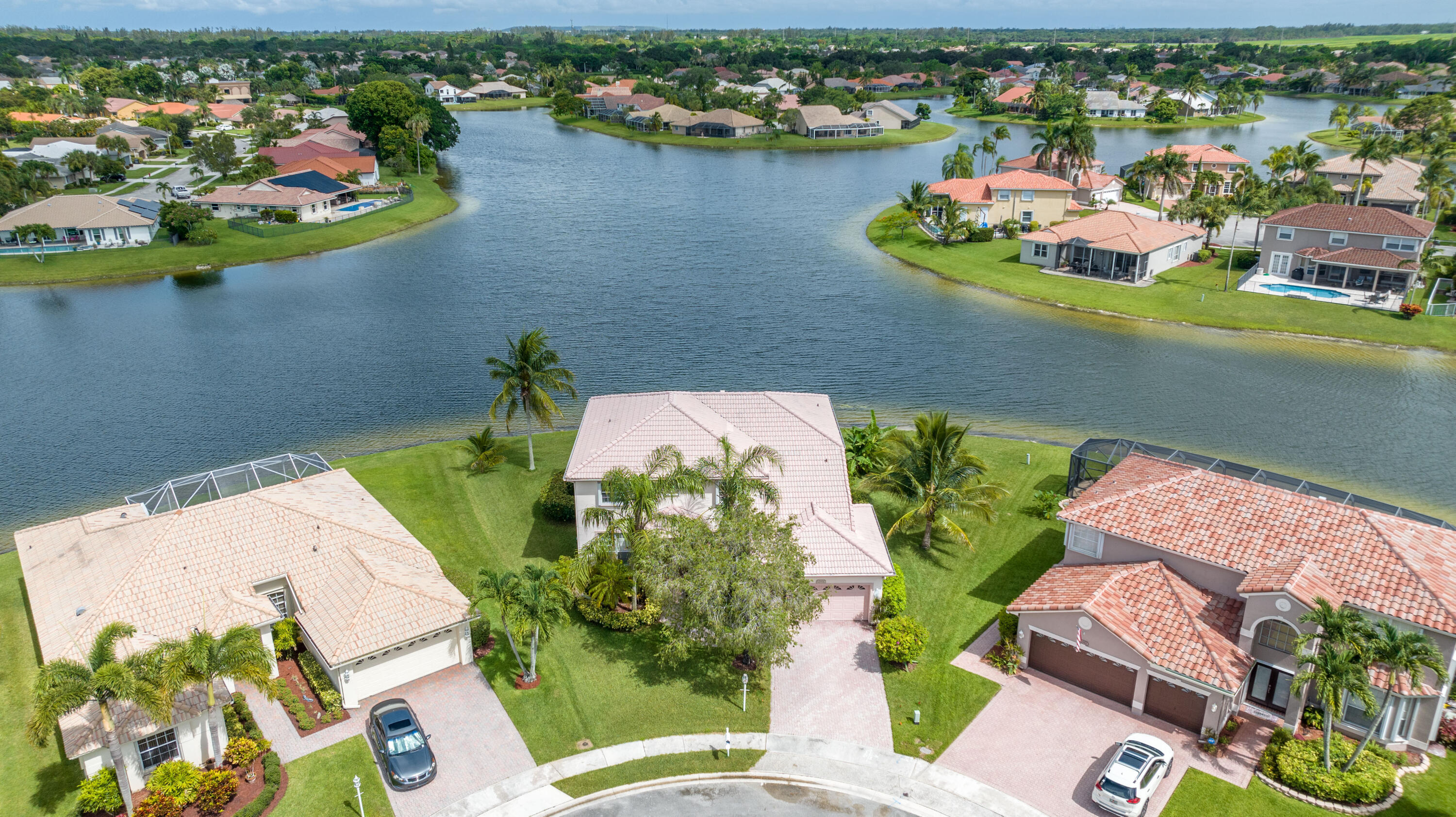 12601 Maypan Drive Boca Raton, FL 33428 - Photo 41 of 46 an aerial view of a house with a lake view