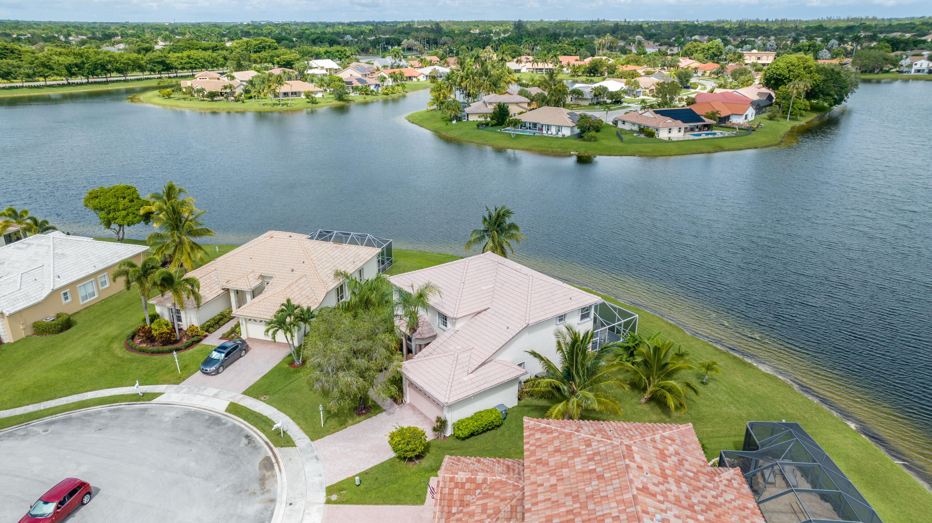 12601 Maypan Drive Boca Raton, FL 33428 - Photo 42 of 46 an aerial view of a house with a lake view