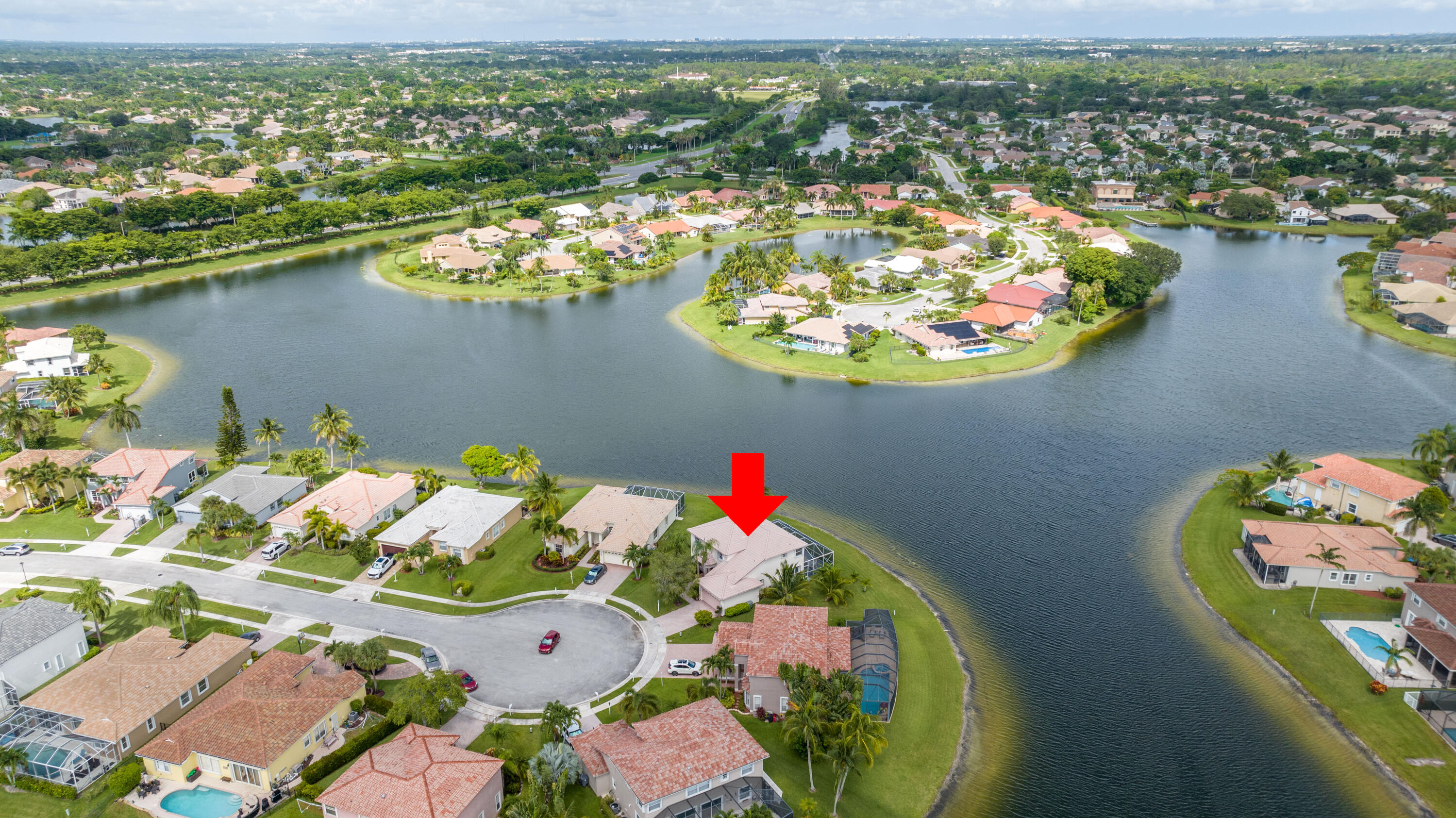 12601 Maypan Drive Boca Raton, FL 33428 - Photo 43 of 46 an aerial view of a house with a lake view