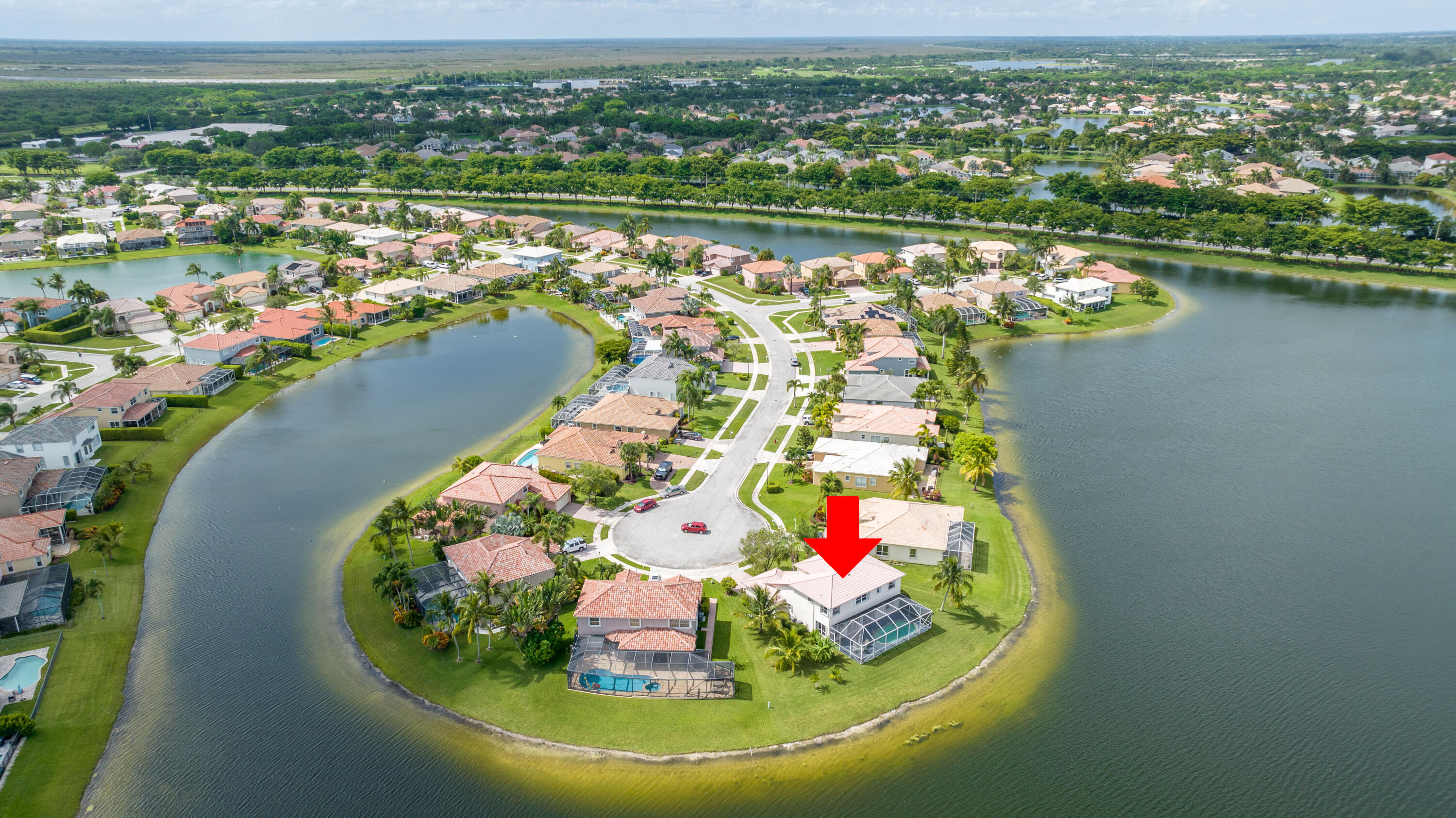 12601 Maypan Drive Boca Raton, FL 33428 - Photo 44 of 46 an aerial view of a house with a swimming pool and outdoor space