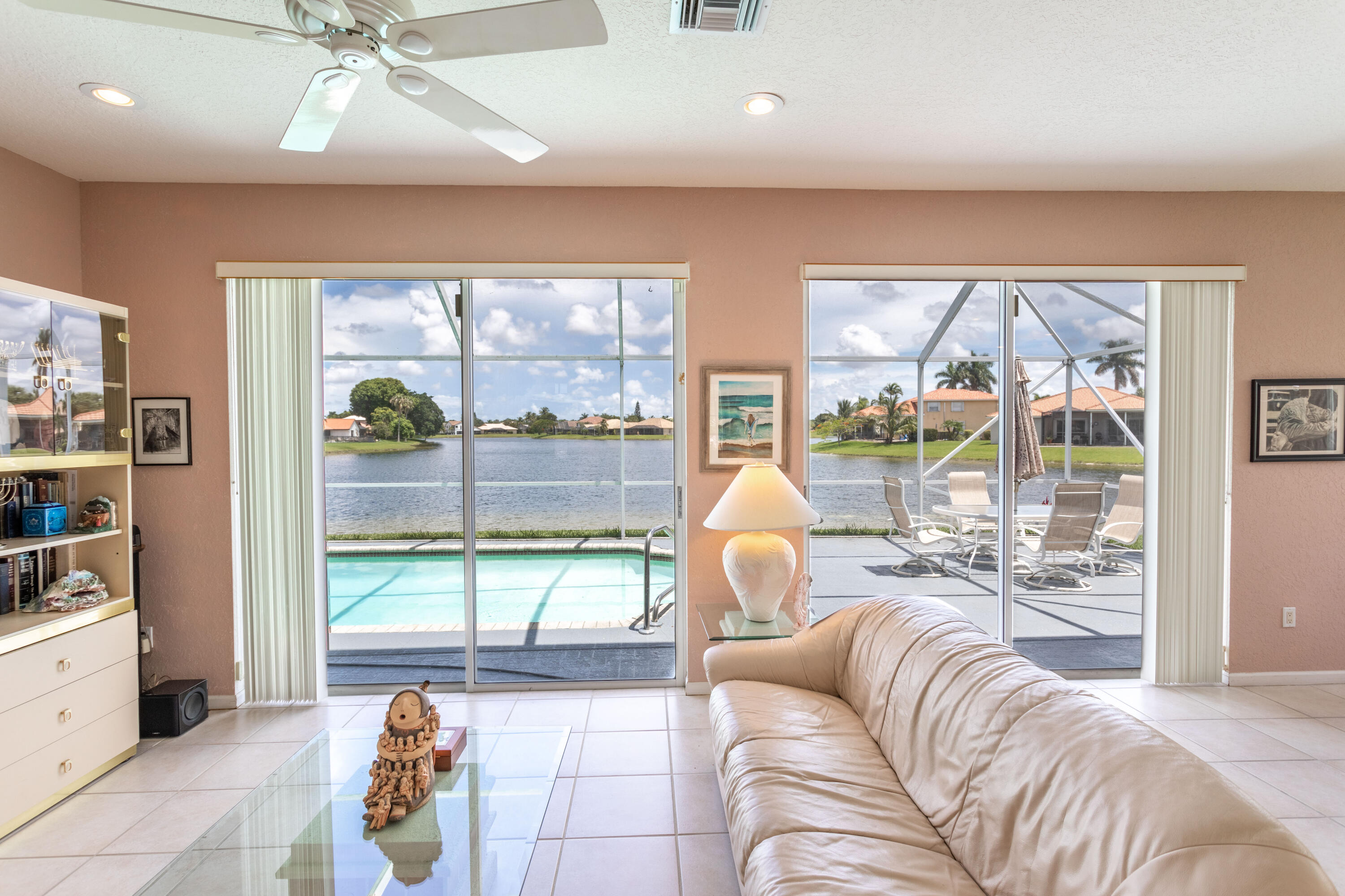 12601 Maypan Drive Boca Raton, FL 33428 - Photo 6 of 46 a living room with furniture and a large window