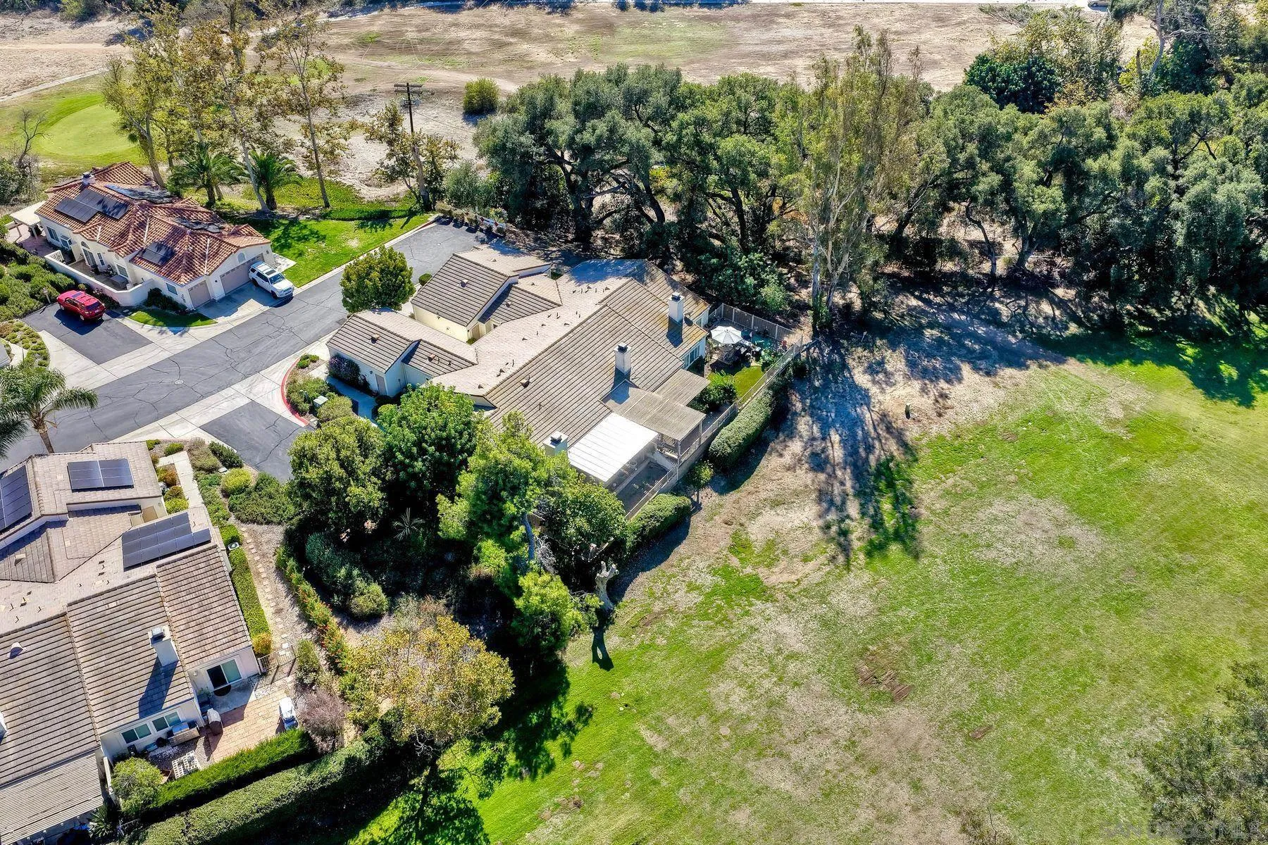 29414 Circle R Greens Drive Escondido, CA 92026 - Photo 26 of 34 an aerial view of residential house with outdoor space and trees all around