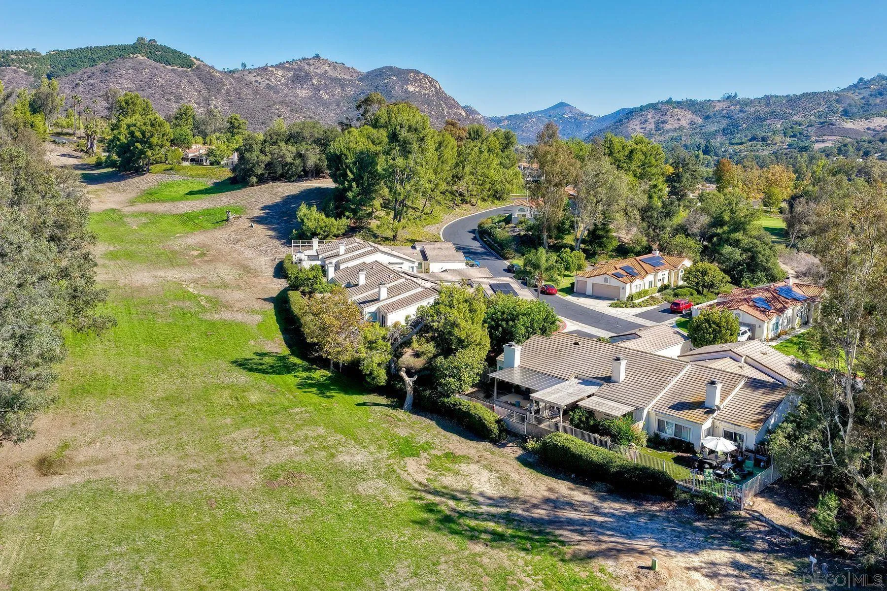 29414 Circle R Greens Drive Escondido, CA 92026 - Photo 28 of 34 an aerial view of residential houses with outdoor space and street view