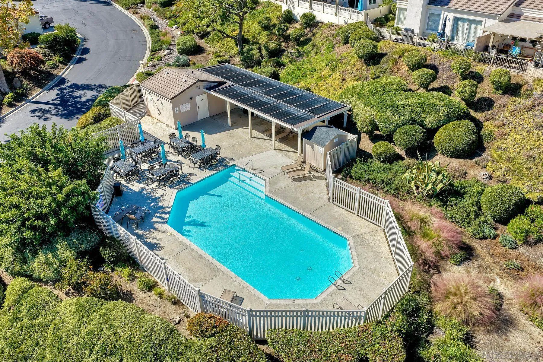 29414 Circle R Greens Drive Escondido, CA 92026 - Photo 32 of 34 a view of a swimming pool with sitting area