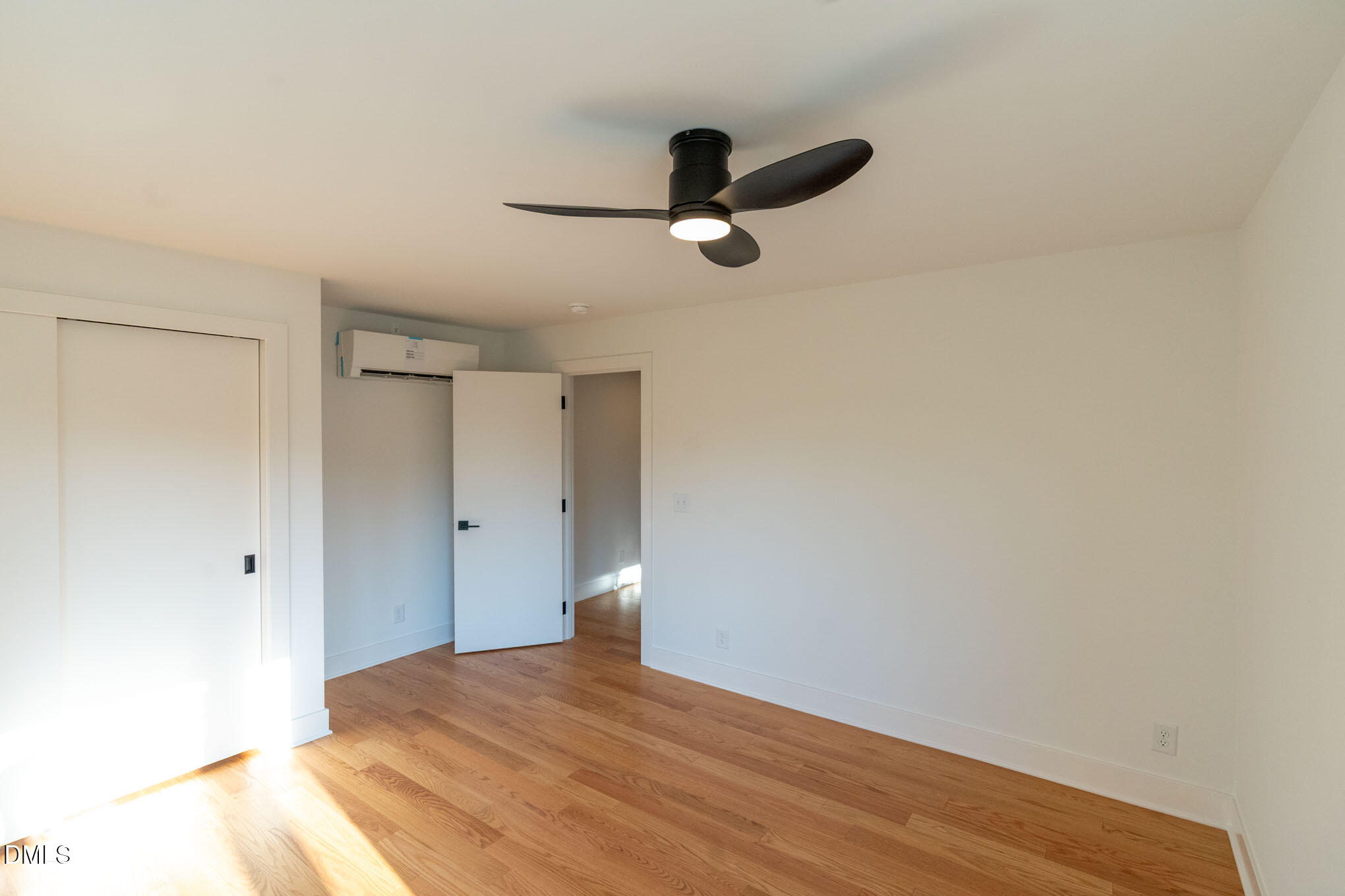 402 East Martin Street Raleigh, NC 27601 - Photo 18 of 23 a view of empty room with wooden floor