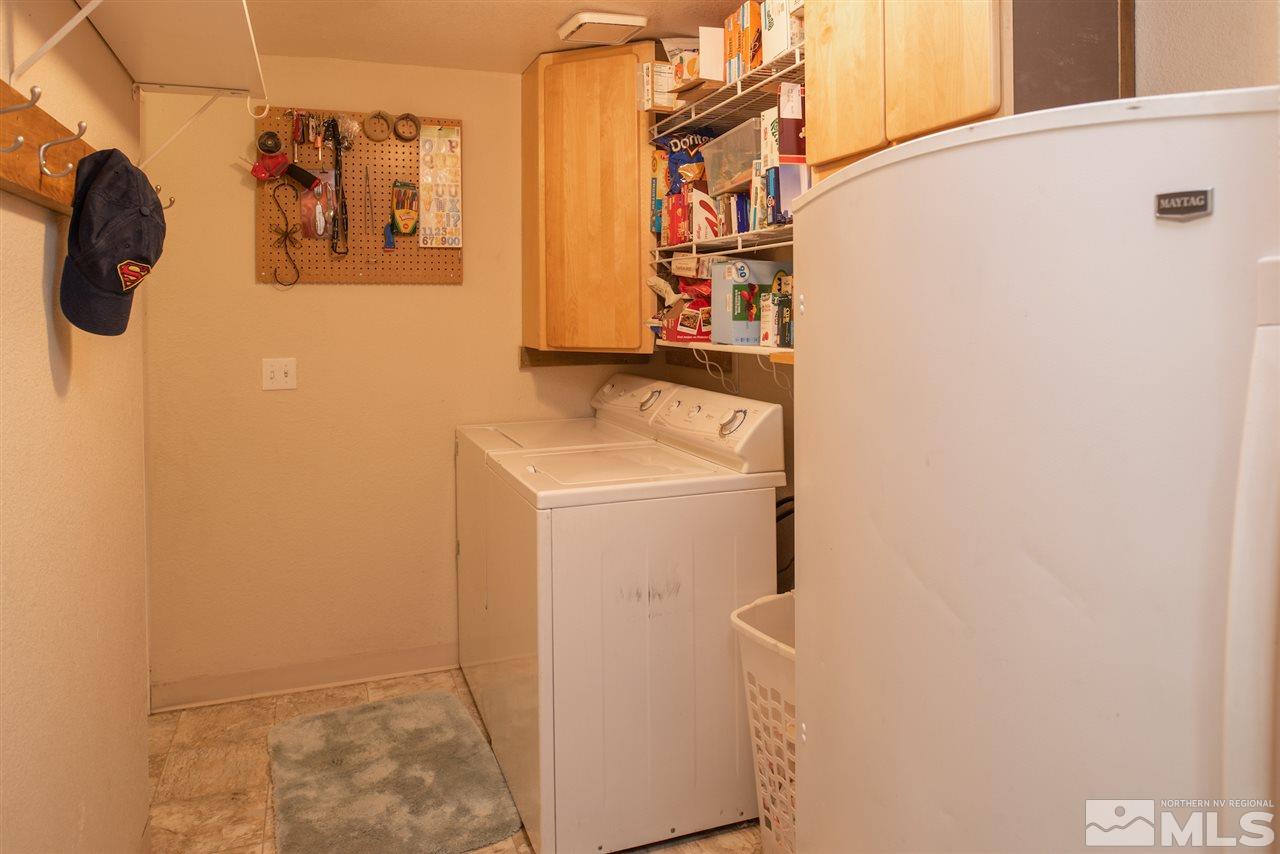 17165 Touraco Street Reno, NV 89508 - Photo 14 of 24 a utility room with dryer and washer