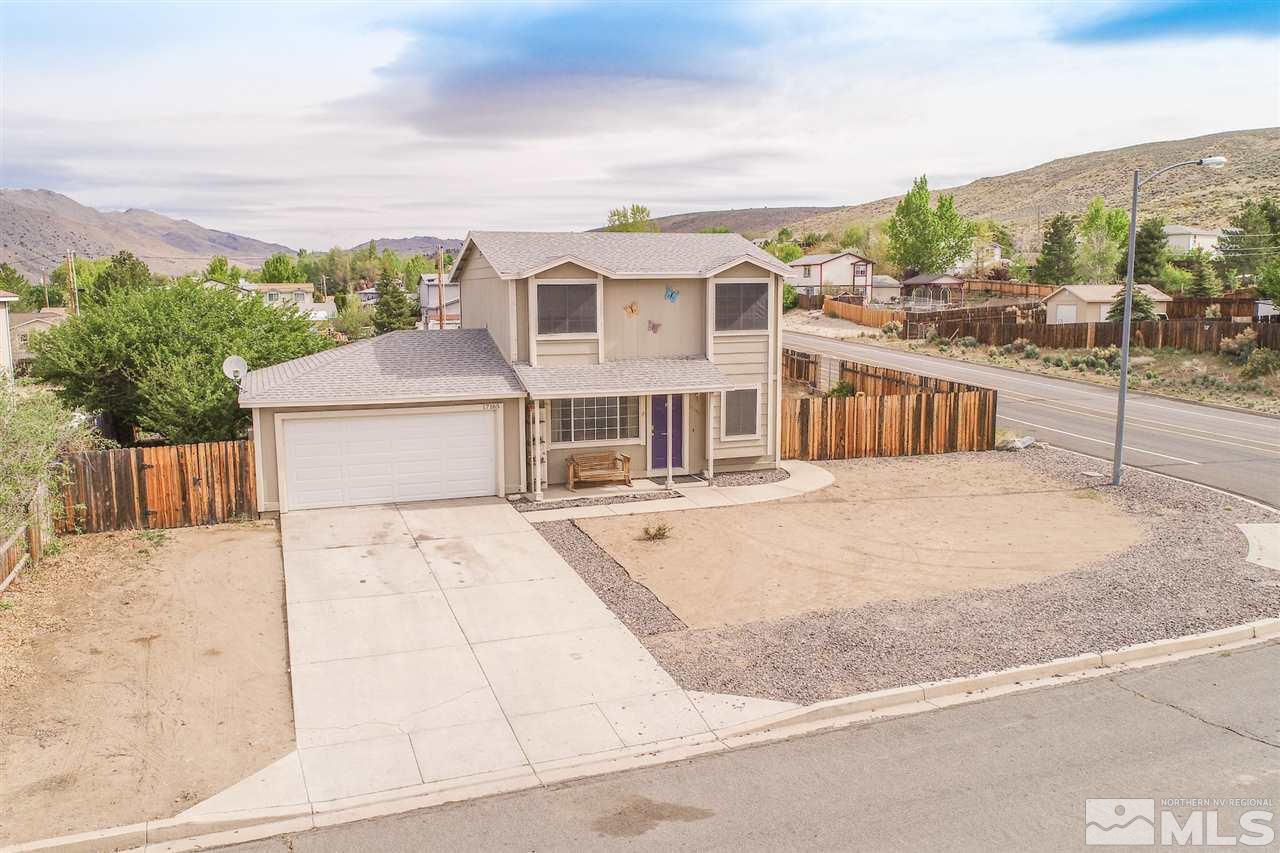 17165 Touraco Street Reno, NV 89508 - Photo 2 of 24 a view of a white house with a outdoor space
