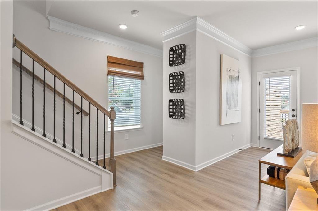 310 Caroline Place, Unit 100 Villa Rica, GA 30180 - Photo 15 of 30 a view of an entryway with wooden floor