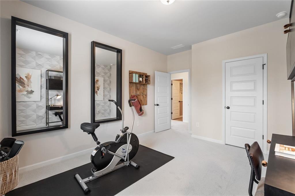 310 Caroline Place, Unit 100 Villa Rica, GA 30180 - Photo 20 of 30 a view of a room with gym equipment