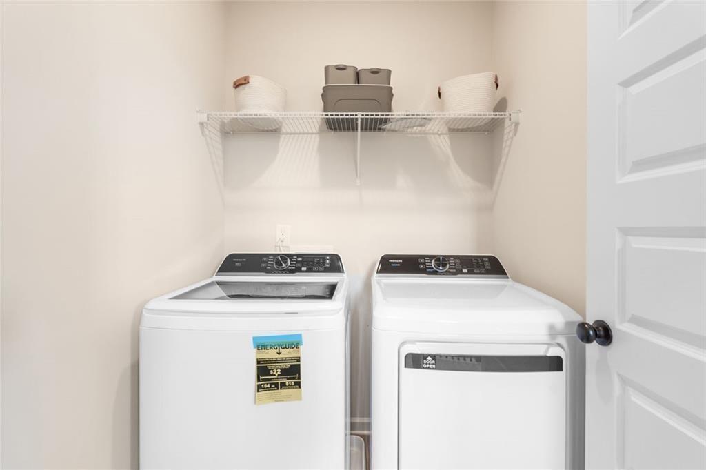 310 Caroline Place, Unit 100 Villa Rica, GA 30180 - Photo 23 of 30 a utility room with dryer and washer