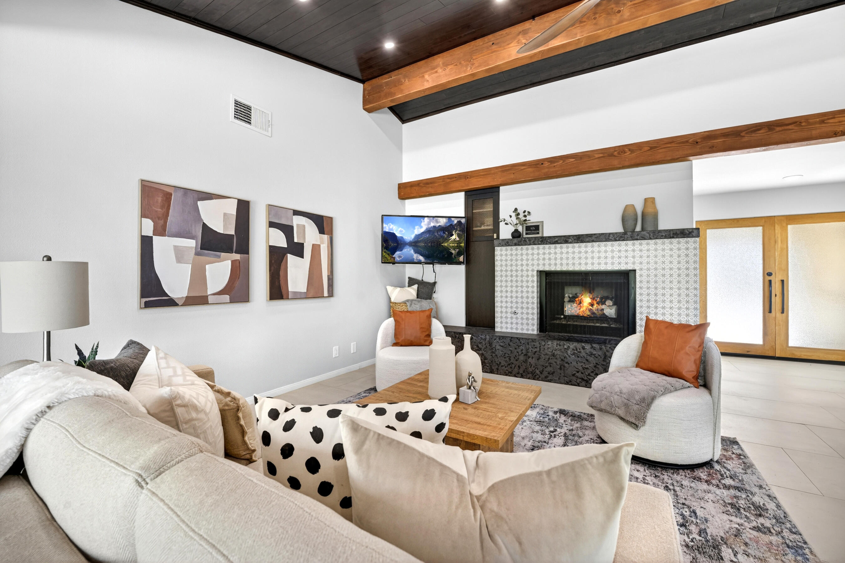 74090 Setting Sun Trail Palm Desert, CA 92260 - Photo 11 of 46 a living room with furniture and a fireplace