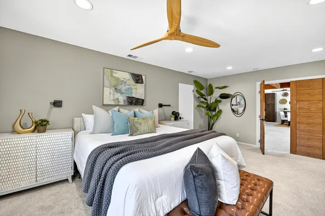 a bathroom with a sink double vanity and shower